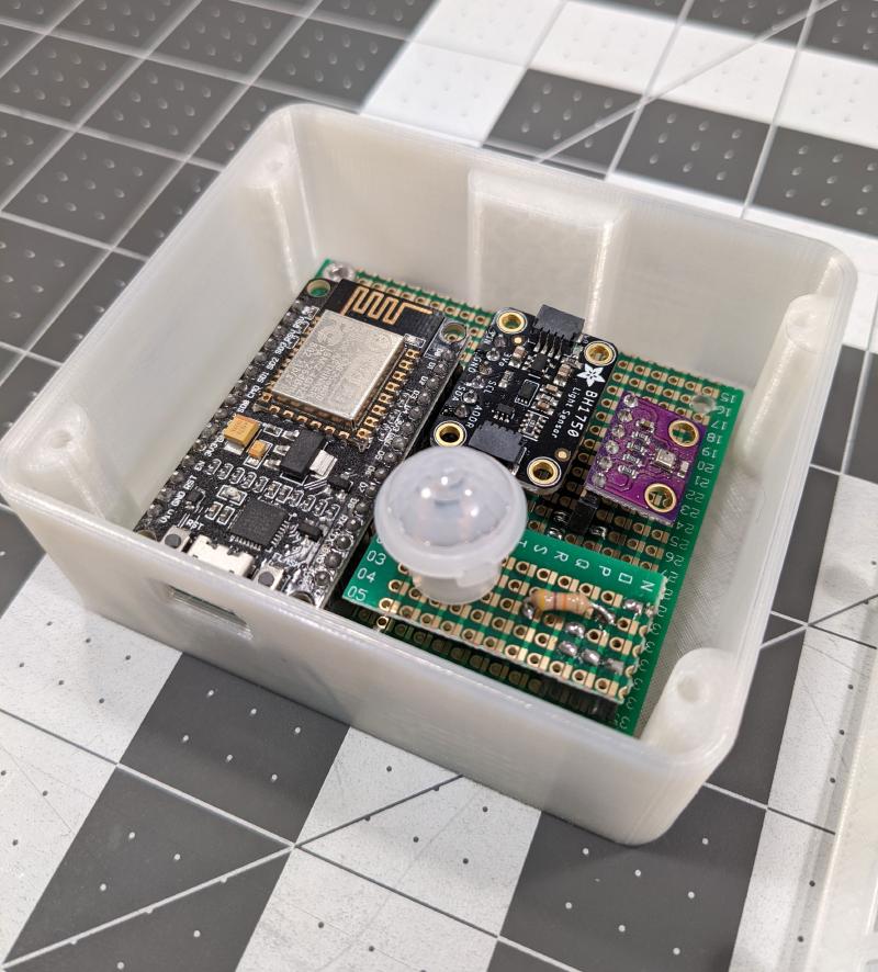 Assembled proto-board installed in case with lid removed